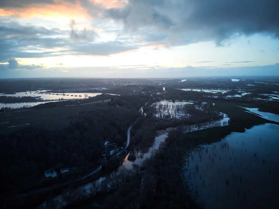 River valley at dawn with flooded fields