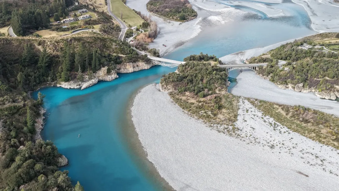 Turquoise river confluence from above